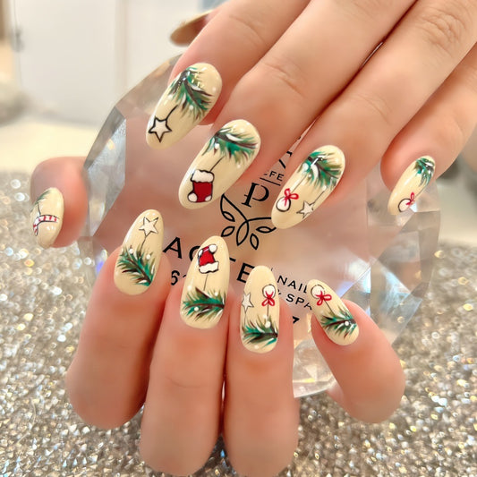 Festive Holiday Christmas Themed Extra Long Almond Shaped Beige Press On Nail Set with Charming Hand-Painted Pine and Ornament Designs