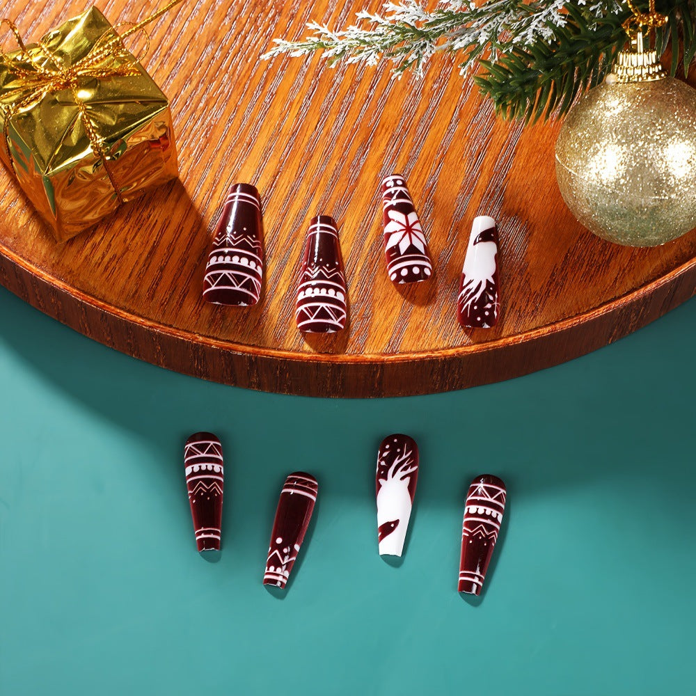 Festive Wonderland Long Coffin Burgundy Press On Nail Set with Snowflake and Reindeer Designs