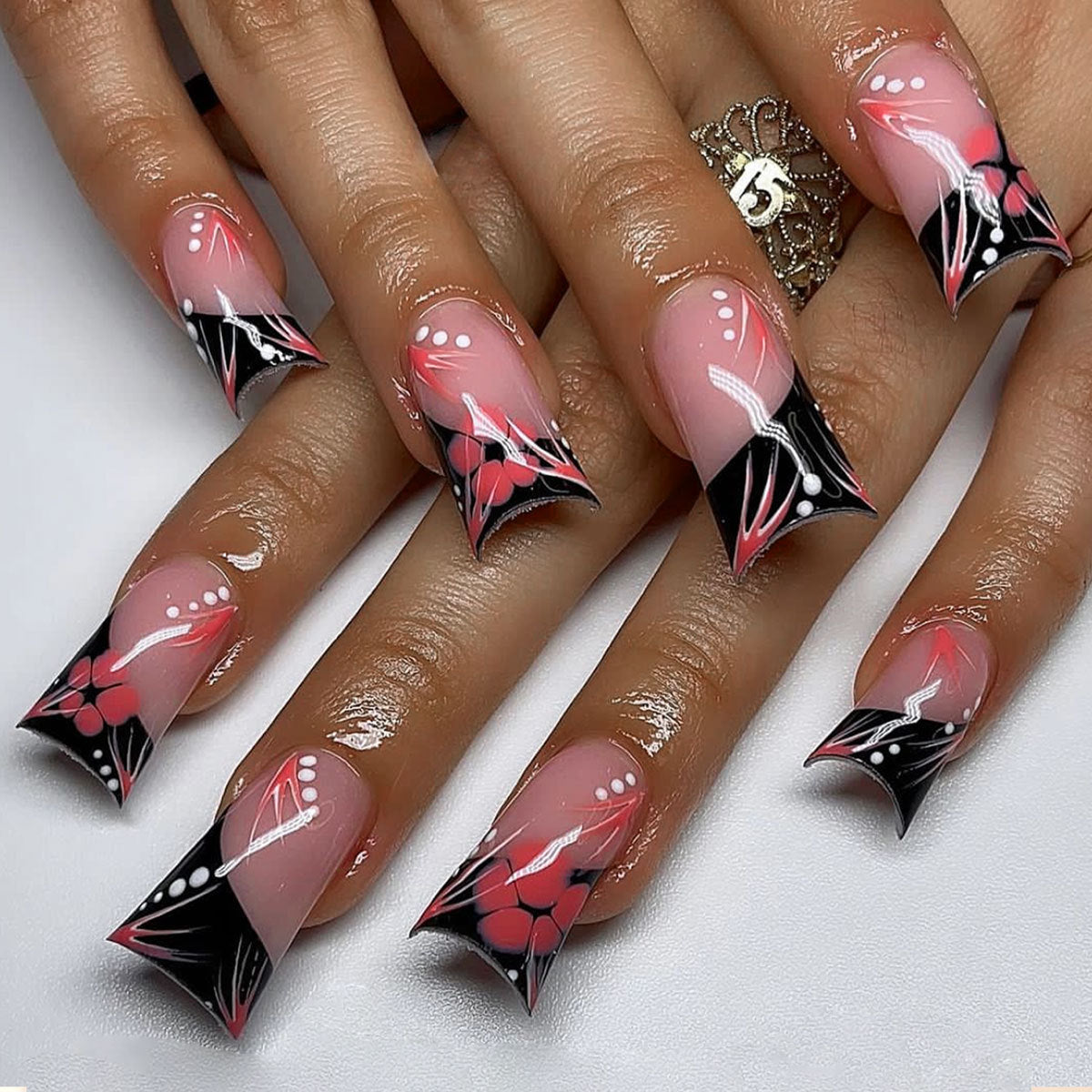 Chic Floral Elegance Long Duck Press On Nail Set in Pink and Black with Unique Artistic Design