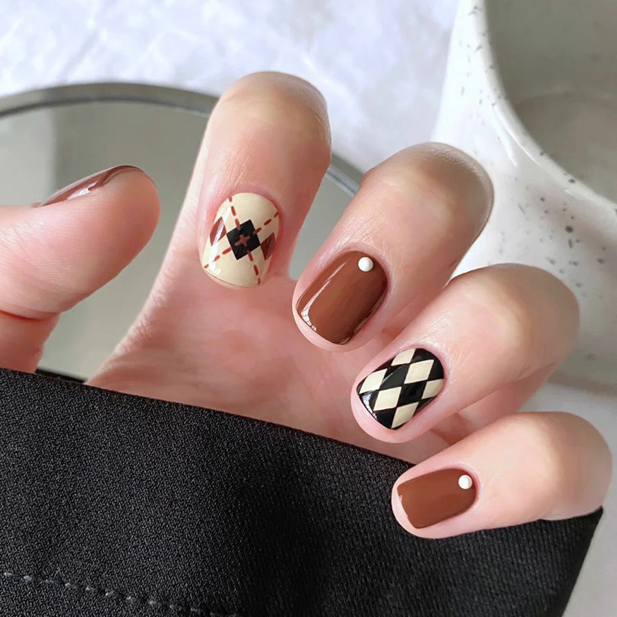 Autumn Charm Medium Squoval Press On Nail Set in Warm Brown and Cream Featuring Chic Argyle Patterns