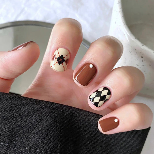 Autumn Charm Medium Squoval Press On Nail Set in Warm Brown and Cream Featuring Chic Argyle Patterns