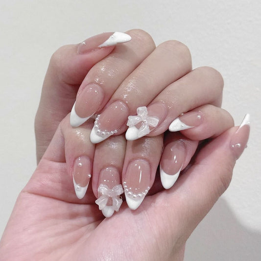 Floral Elegance Long Almond White Tip Press On Nail Set with Decorative Bows and Pearls