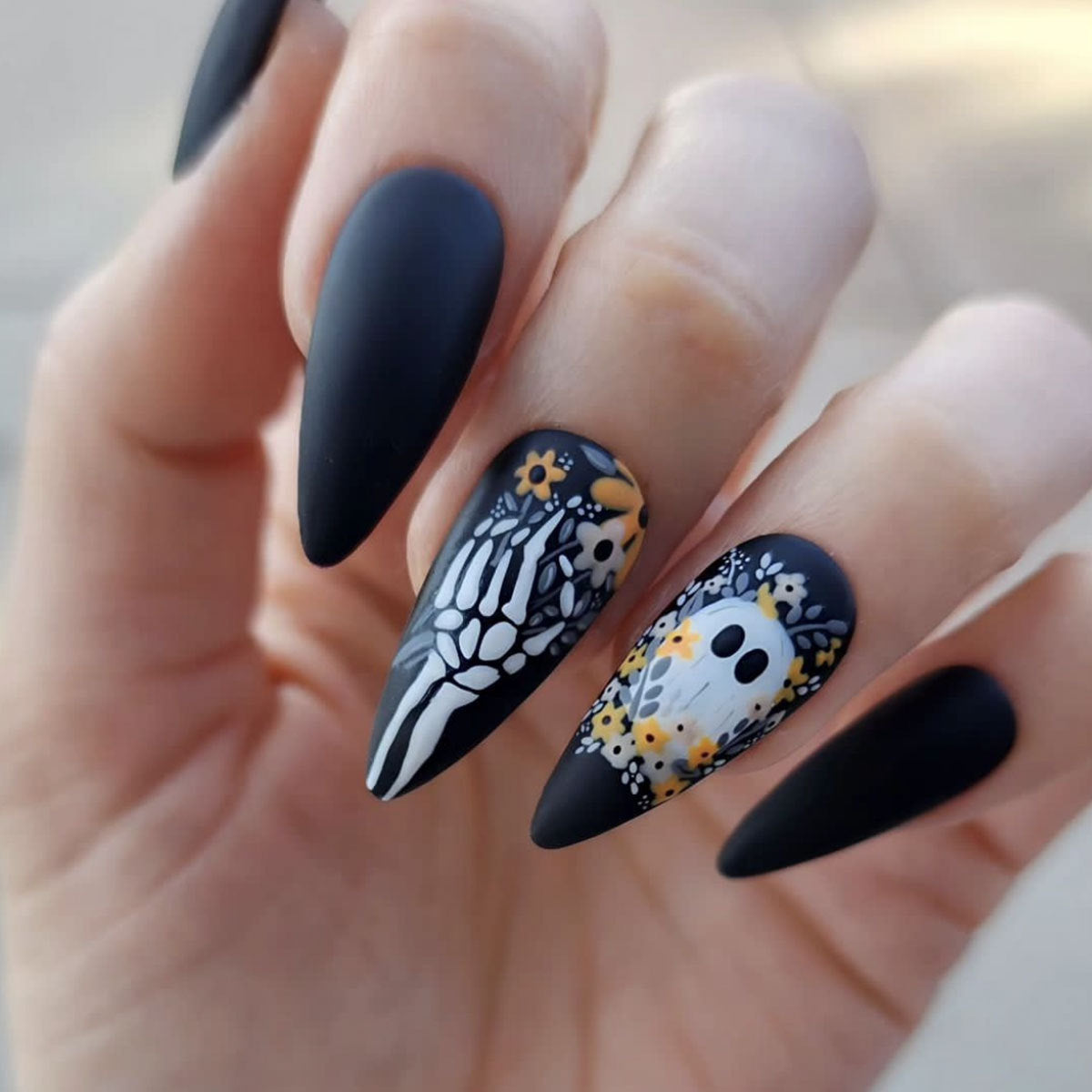 Spooky Floral Elegance Long Stiletto Matte Black Press On Nail Set with Skeleton and Ghost Design