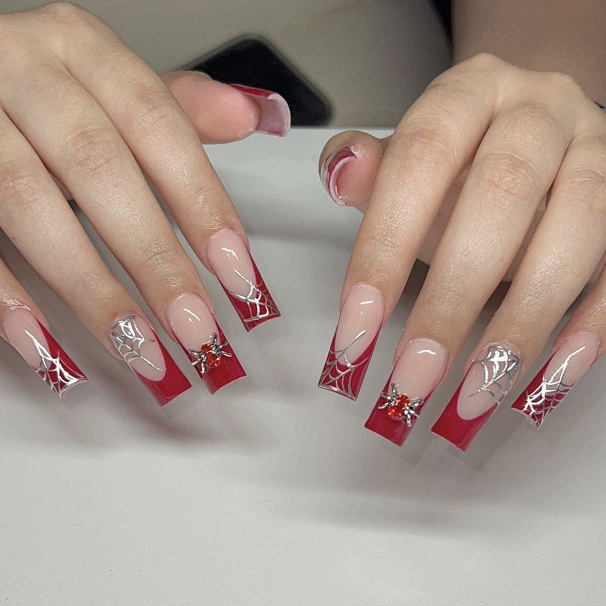 Spooky Glam Square Red and Beige Press On Long Nail Set with Spider Web Design and Gem Accents