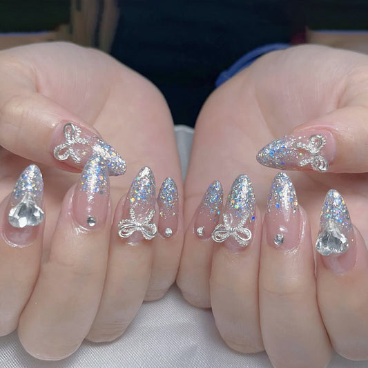 Glittering Fairy Tale Long Almond Press On Nail Set Silver and Blue Sparkle with Rhinestone and Bow Accents