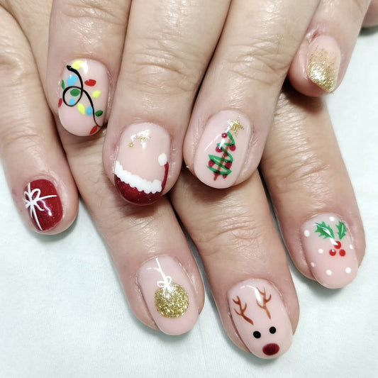 Festive Wonderland Press On Nail Set Medium Round Red Green Gold with Holiday Themed Designs