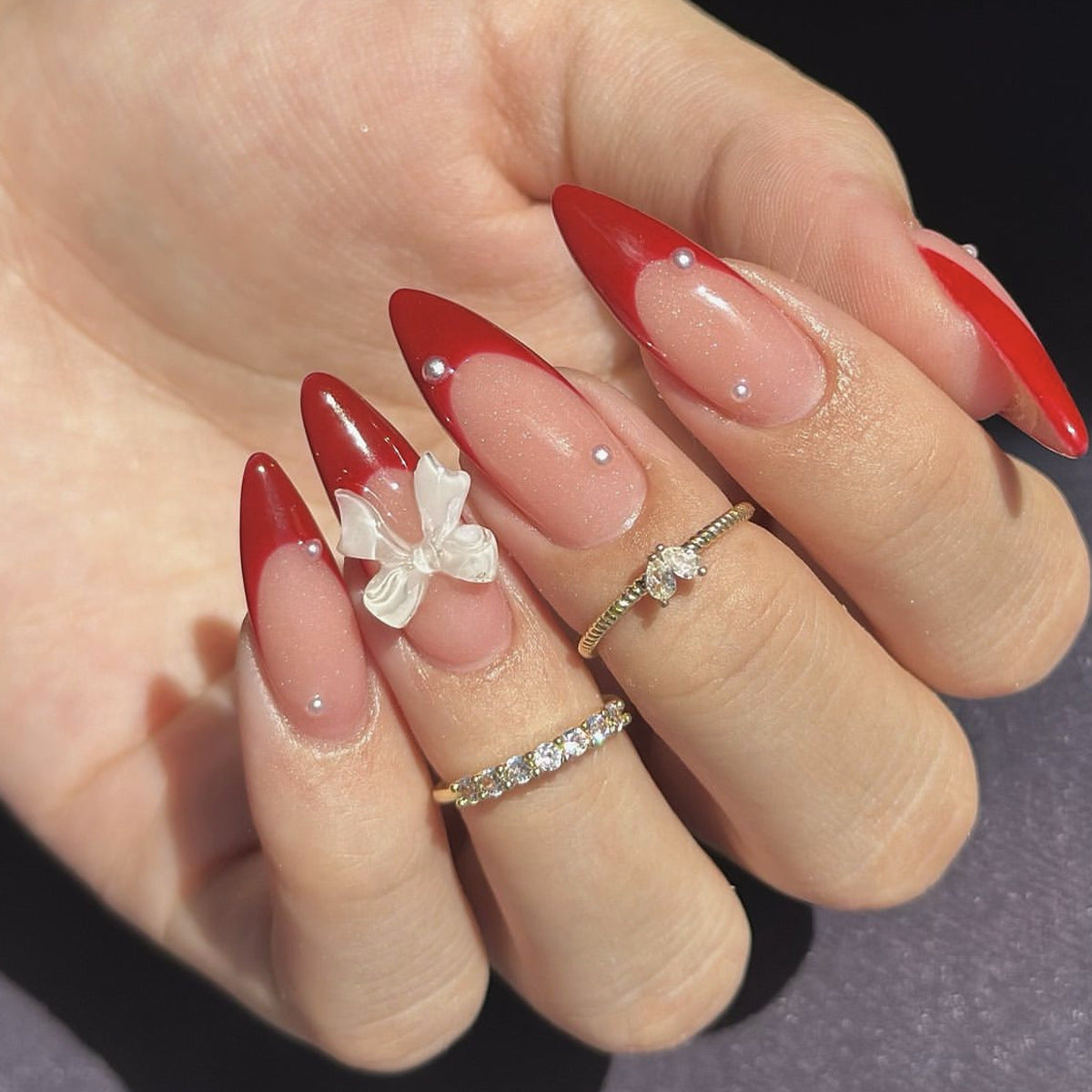 Elegant Butterfly Dream Red Medium Almond Press-On Nails with Delicate Floral Accent and Pearls