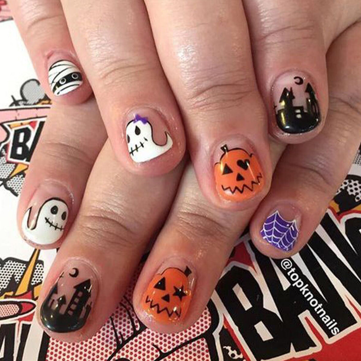 Spooktacular Halloween Short Round Orange and White Press On Nail Set with Ghosts and Pumpkins Design