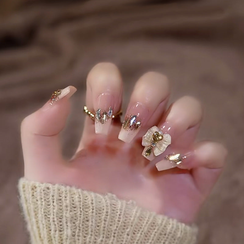 Elegant Blossom Dream Long Coffin Beige with Gold Glitter and Floral Accent Press-On Nail Set