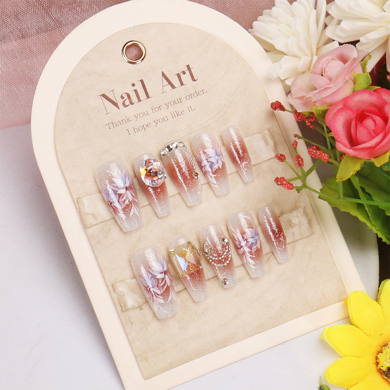 Blossoming Elegance Long Coffin Clear Pink Ombre Nail Set with Floral Design and Rhinestone Accents