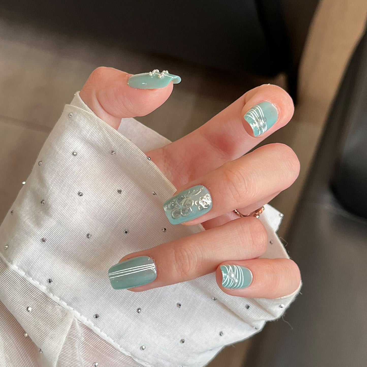 Ocean Breeze Inspired Stylish Medium Square Mint Green Press On Nail Set with Floral and Striped Accents