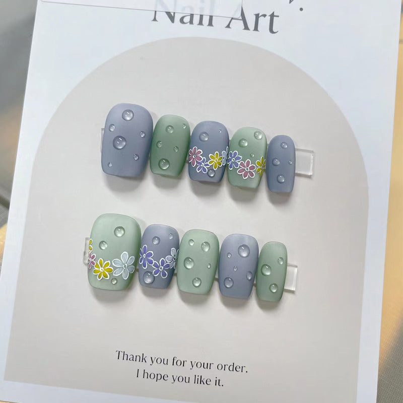 Garden Bliss Press-On Nail Set in Short Length Coffin Shape in Soft Green and Grey with Floral Accents and Dewdrop Finish