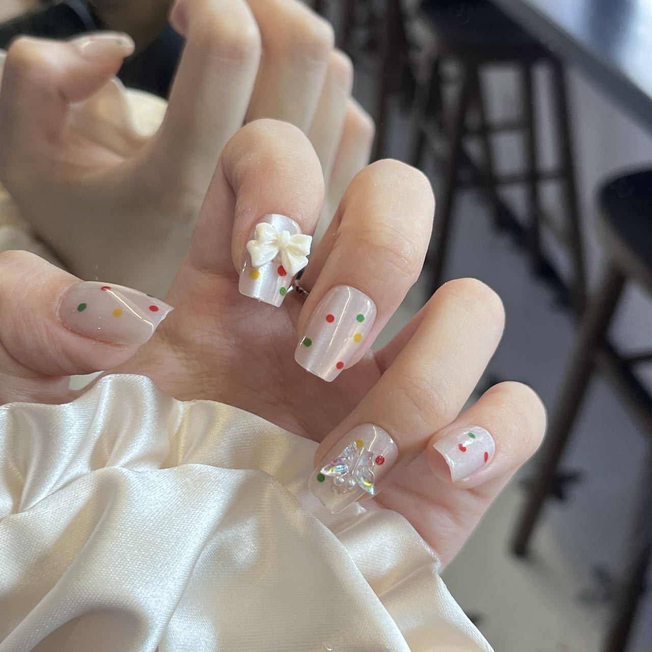 Festive Charm Medium Square Clear Press On Nail Set with Colorful Dot Design and Elegant Floral Accent