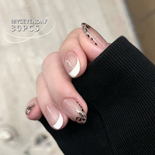 Elegant Floral Dream Short Oval Natural Beige with Chic Black Floral Design Press on Nail Set