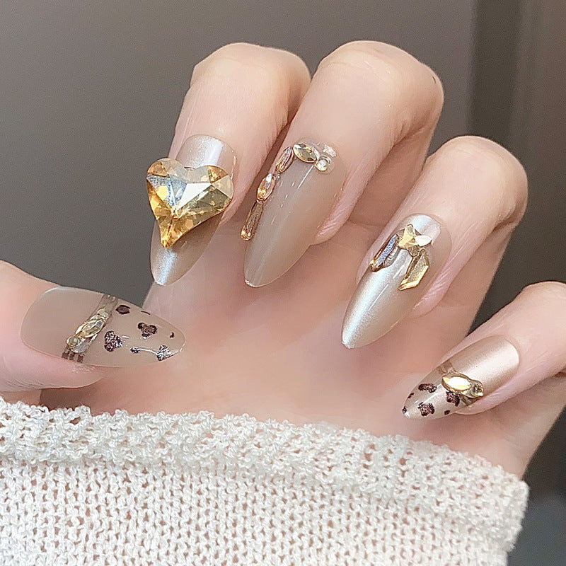 Glamorous Elegance Long Almond Beige Press on Nail Set with Stunning Jewel Embellishments