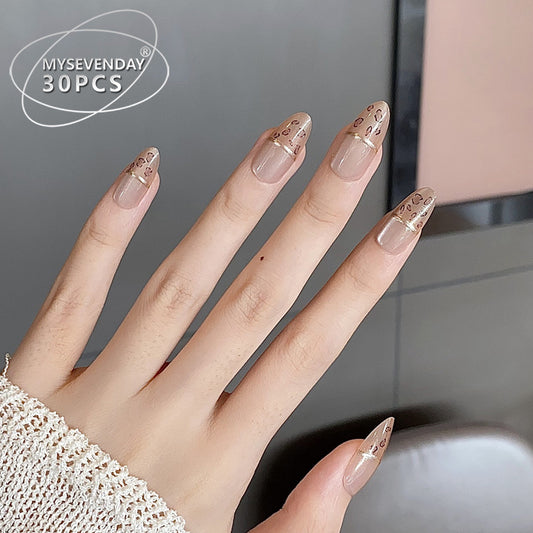 Glamorous Feline Fantasy Medium Almond Beige Press On Nail Set with Gold Accent and Leopard Print Tips