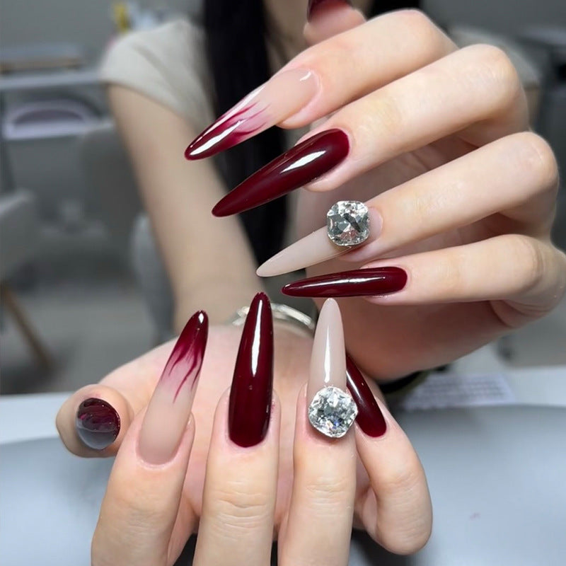 Glamorous Elegance Long Stiletto Burgundy and Beige Nail Set with Stunning Rhinestone Accent