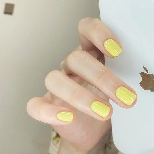 Sunny Delight Short Oval Yellow Press On Nail Set with Glossy Finish