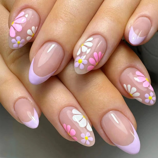 Spring Whispers Medium Oval Press On Nails in Sheer Beige with Lilac Tips and Daisy Design