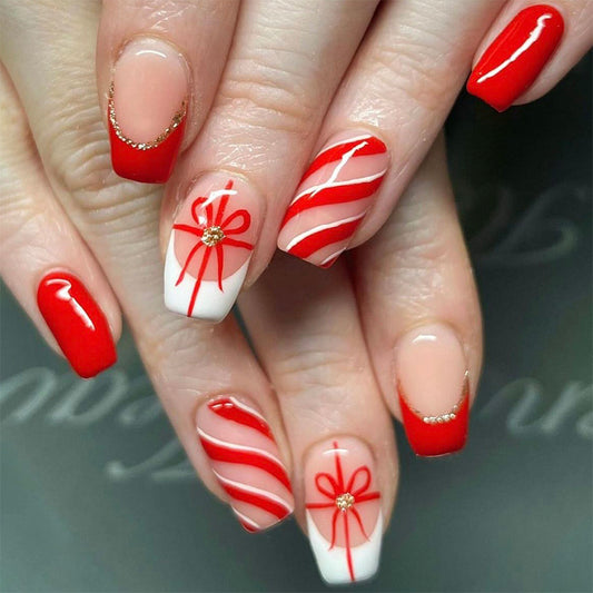 Festive Celebration Long Coffin Red and White Press On Nail Set with Gift Bow Design and Glitter Accents