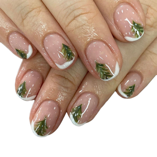 Winter Wonderland Medium Oval Press On Nail Set in Clear Pink with White Tips and Festive Green Tree Accents