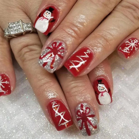 Winter Wonderland Medium Square Red and Silver Press On Nail Set with Festive Snowman and Holiday Bow Designs