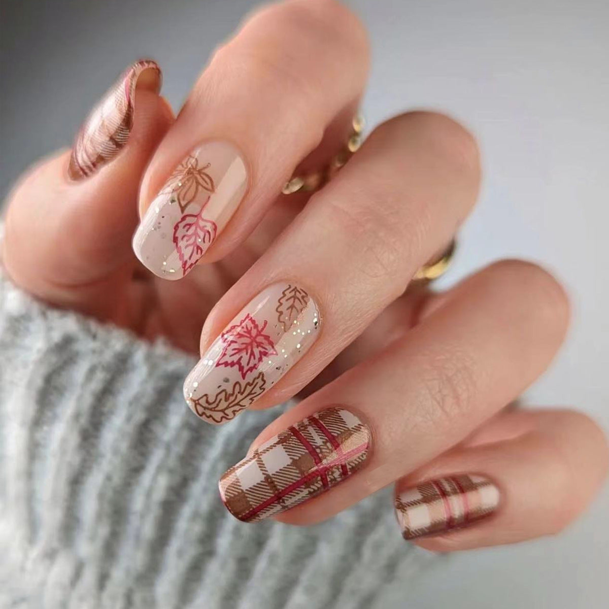 Autumn Vibes Long Round Beige and Brown Plaid Press On Nail Set with Intricate Leaf Designs and Glitter Accents