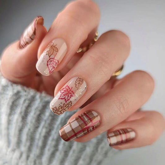 Autumn Vibes Long Round Beige and Brown Plaid Press On Nail Set with Intricate Leaf Designs and Glitter Accents