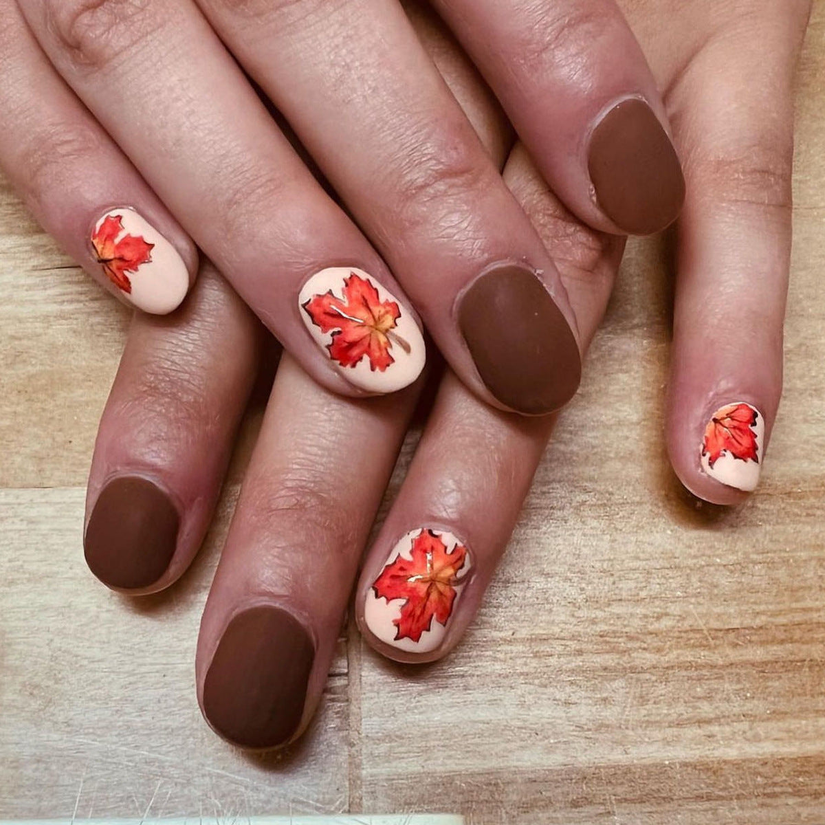 Autumn Bliss Medium Oval Brown and Beige Press On Nail Set with Vibrant Fall Leaf Art