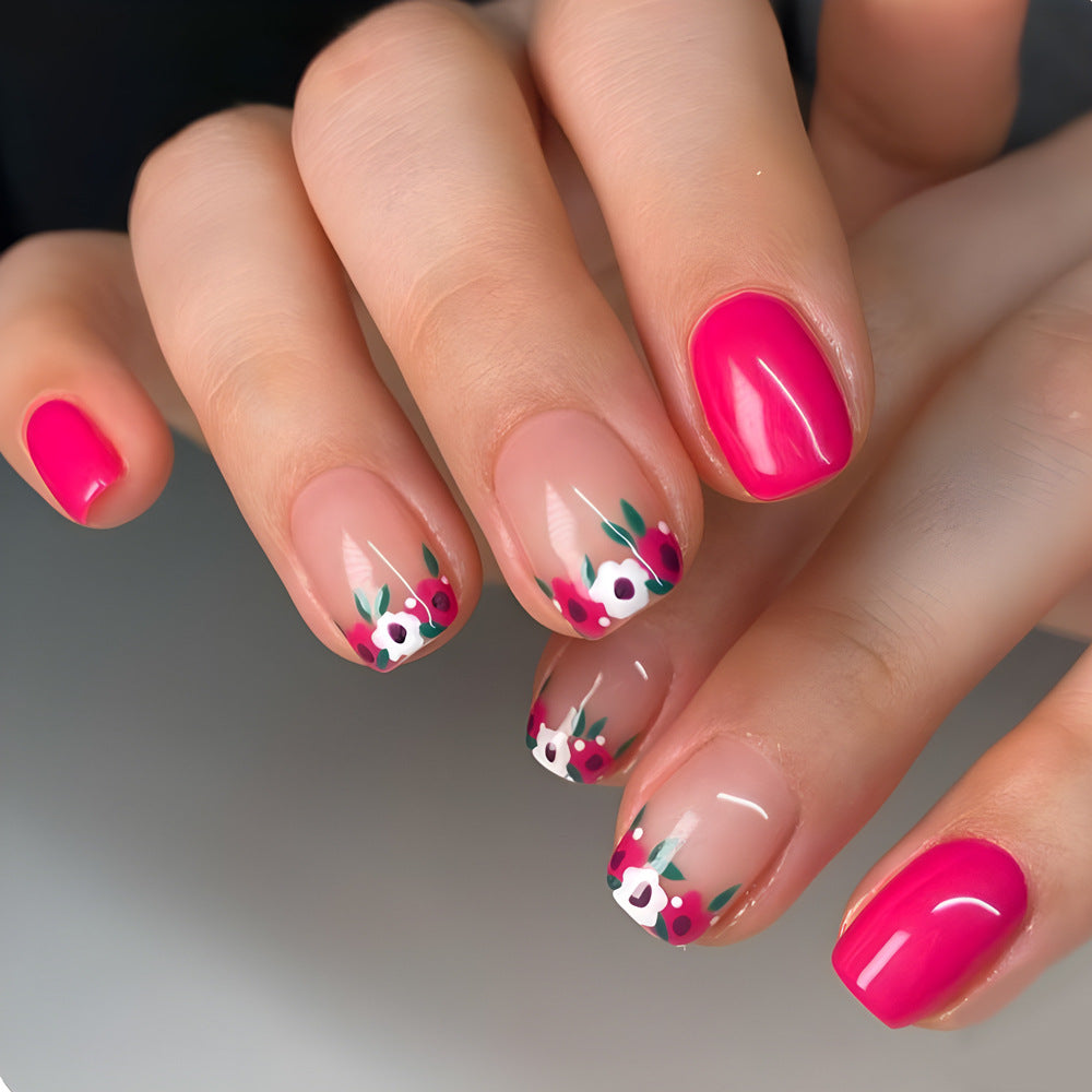 Floral Bliss Short Oval Pink Press On Nail Set with Elegant French Tips and Hand-Painted Floral Accents