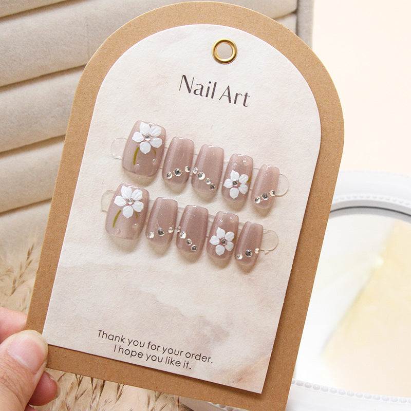 Floral Elegance Medium Square Beige Press On Nail Set with White Blossoms and Rhinestone Accents