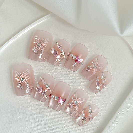 Whimsical Fairy Dust Long Square Pink Press On Nail Set with Sparkling Butterfly Design and Gemstone Accents