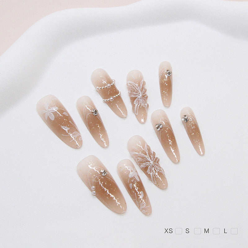 Blossoming Elegance Long Almond Beige Press On Nail Set with Floral Accents and Shimmering Gems