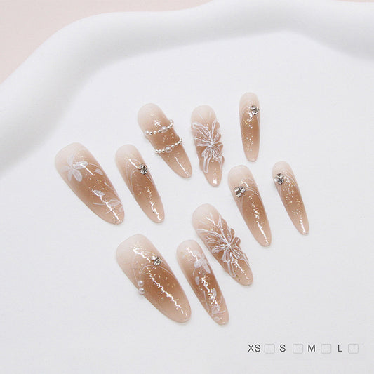 Blossoming Elegance Long Almond Beige Press On Nail Set with Floral Accents and Shimmering Gems