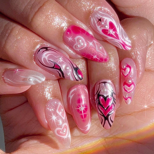 Romantic Heart Almond Shaped Long Pink Press On Nail Set with Pearl Accents and Swirling Design