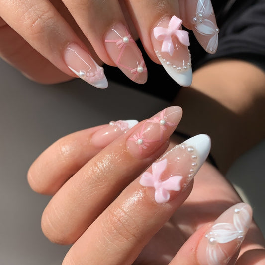 Whimsical Elegance Long Almond Press On Nail Set Pink and White with Pearls Ribbons and Floral Accents