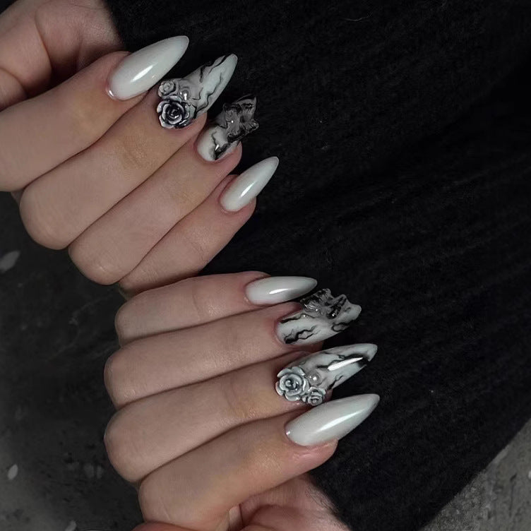 Gothic Elegance Long Almond Shaped Glossy White and Marble Nail Set with Floral Detailing