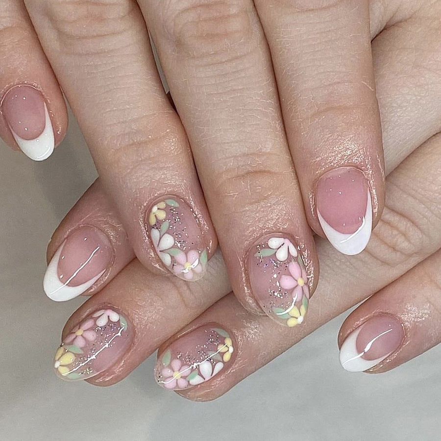 Floral Fantasy Medium Almond White and Pink Press On Nail Set with Delicate Flower Designs and Glitter Accents