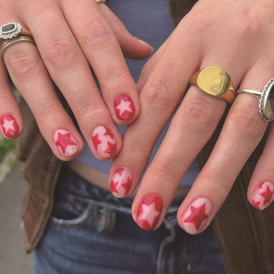 Starry Night Themed Short Round Red Press On Nail Set with Playful White Stars