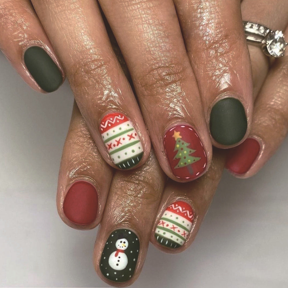 Festive Charm Medium Oval Green Red and White Christmas Themed Press On Nail Set with Unique Snowman and Tree Designs