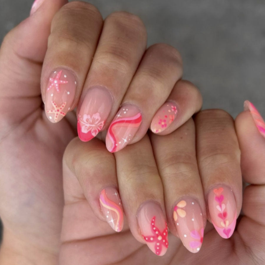 Beach Bliss Pink Almond Press On Long Nail Set with Floral and Starfish Designs for Instant Glamour