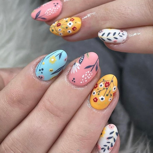 Floral Delight Medium Oval Pastel Press On Nail Set with Whimsical Flower Patterns