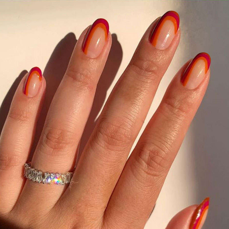 Sunset Glow Medium Oval Red and Orange Ombre Press On Nail Set with Iridescent Finish