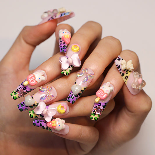 Charming Whimsical Long Coffin Pastel Pink and Black Leopard Print Press On Nail Set with Playful Three Dimensional Decorations