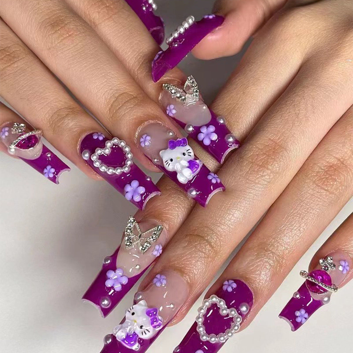 Kitty's Garden Party Long Coffin Purple Press-On Nails with Floral Patterns and Cartoon Cat Accents