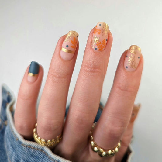 Autumn Flora Medium Round Press On Nail Set in Warm Beige Orange with Gold Leaf Accents and Elegant Matte Finish