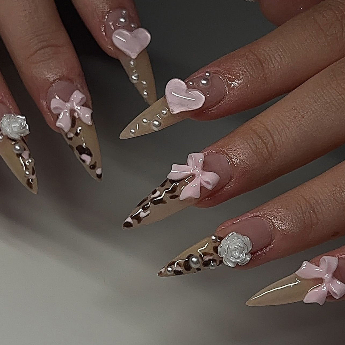 Sweet Treats Stiletto Shaped Beige and Pink Press On Long Nail Set with Heart and Bow Accents