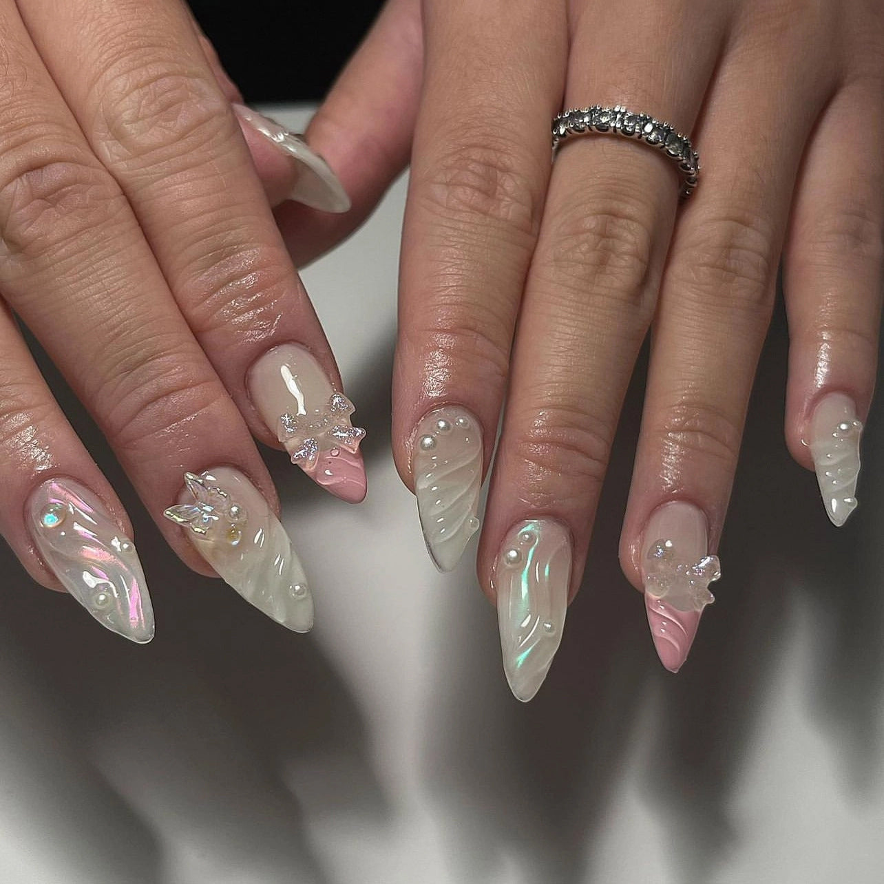 Mermaid Dreams long stiletto press on nail set in iridescent white and soft pink with pearl and gem embellishments