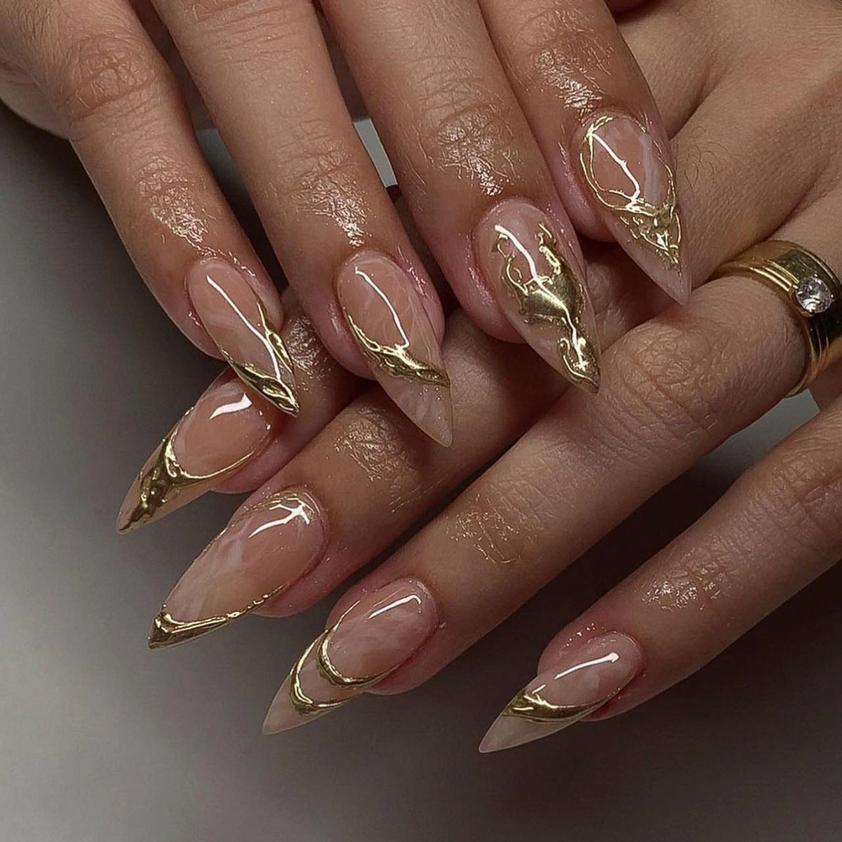 Glamorous Golden Wave Long Stiletto Beige Press On Nails with Elegant Metallic Accent