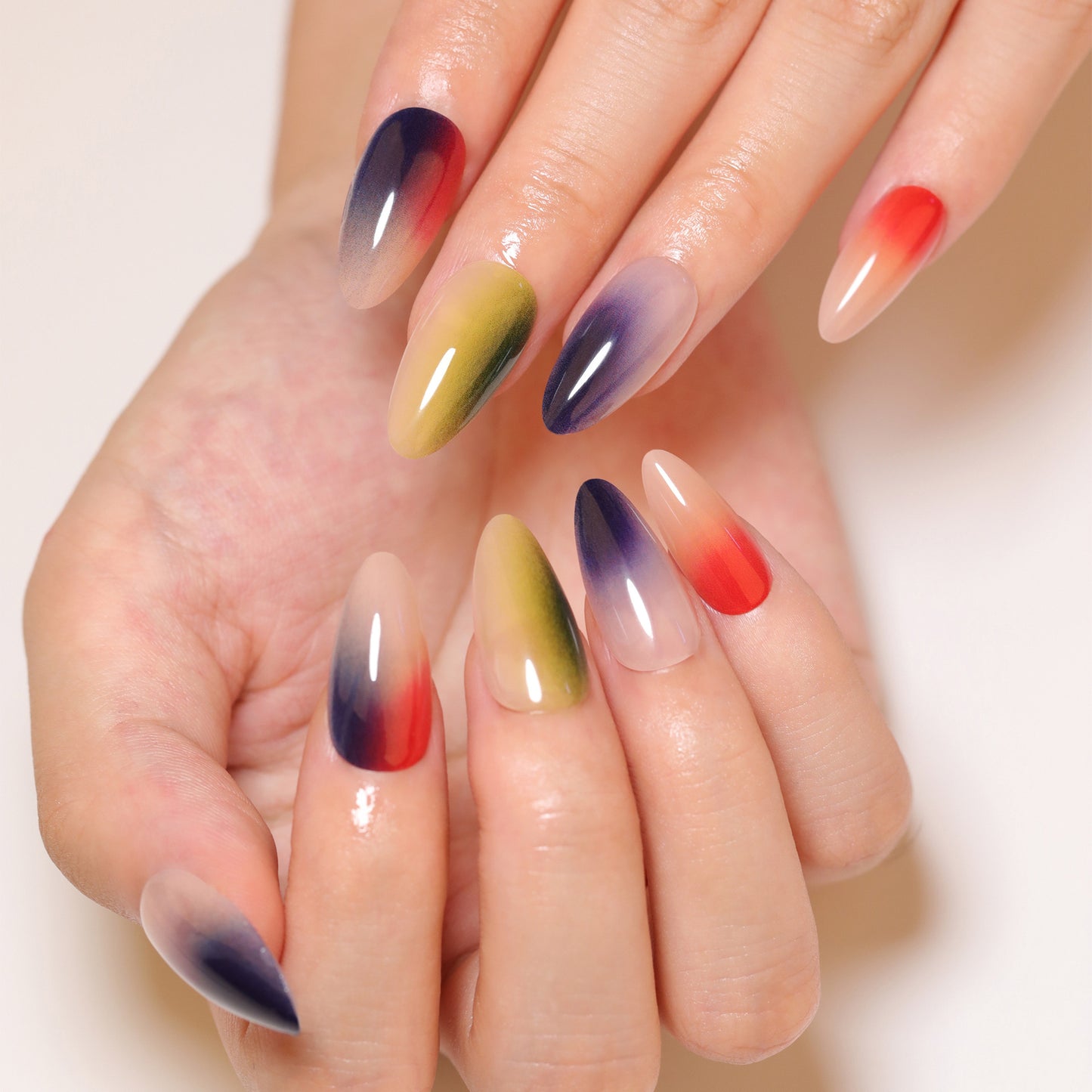 Artistic Autumn Ombre Long Almond Shaped Press On Nail Set with Vibrant Gradient Colors and Unique Color Fade Design